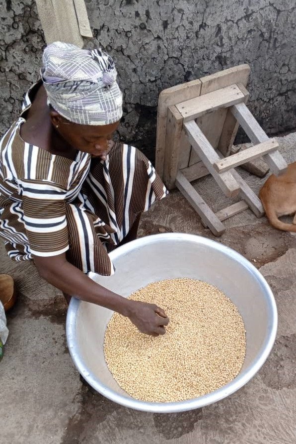 a woman looking at seeds